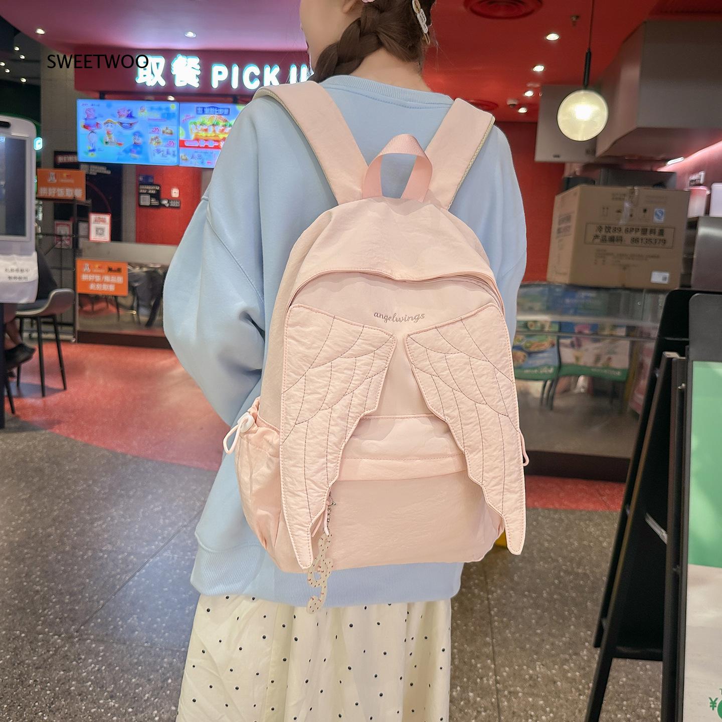 Embroidery Quilting - กระเป๋าเป้สะพายหลังผู้หญิงสีชมพูปีกนางฟ้า ปักลายปีกนก น้ำหนักเบา ทำจากไนลอน เหมาะสำหรับใช้ในชีวิตประจำวัน ไปโรงเรียน